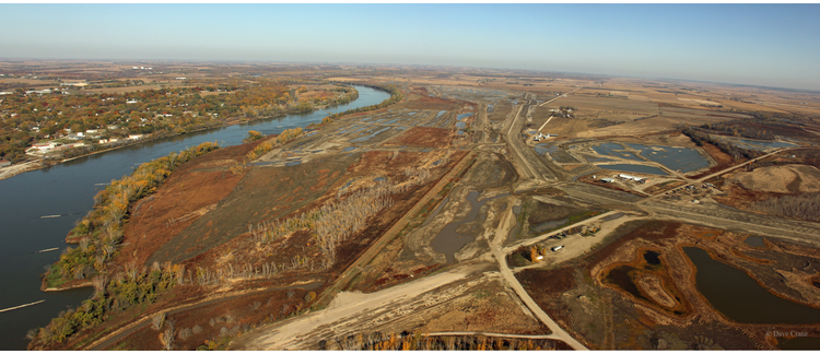 Evaluating and Enhancing the Design of Borrow Pit Wetlands for Managing Nutrients in Agricultural Runoff